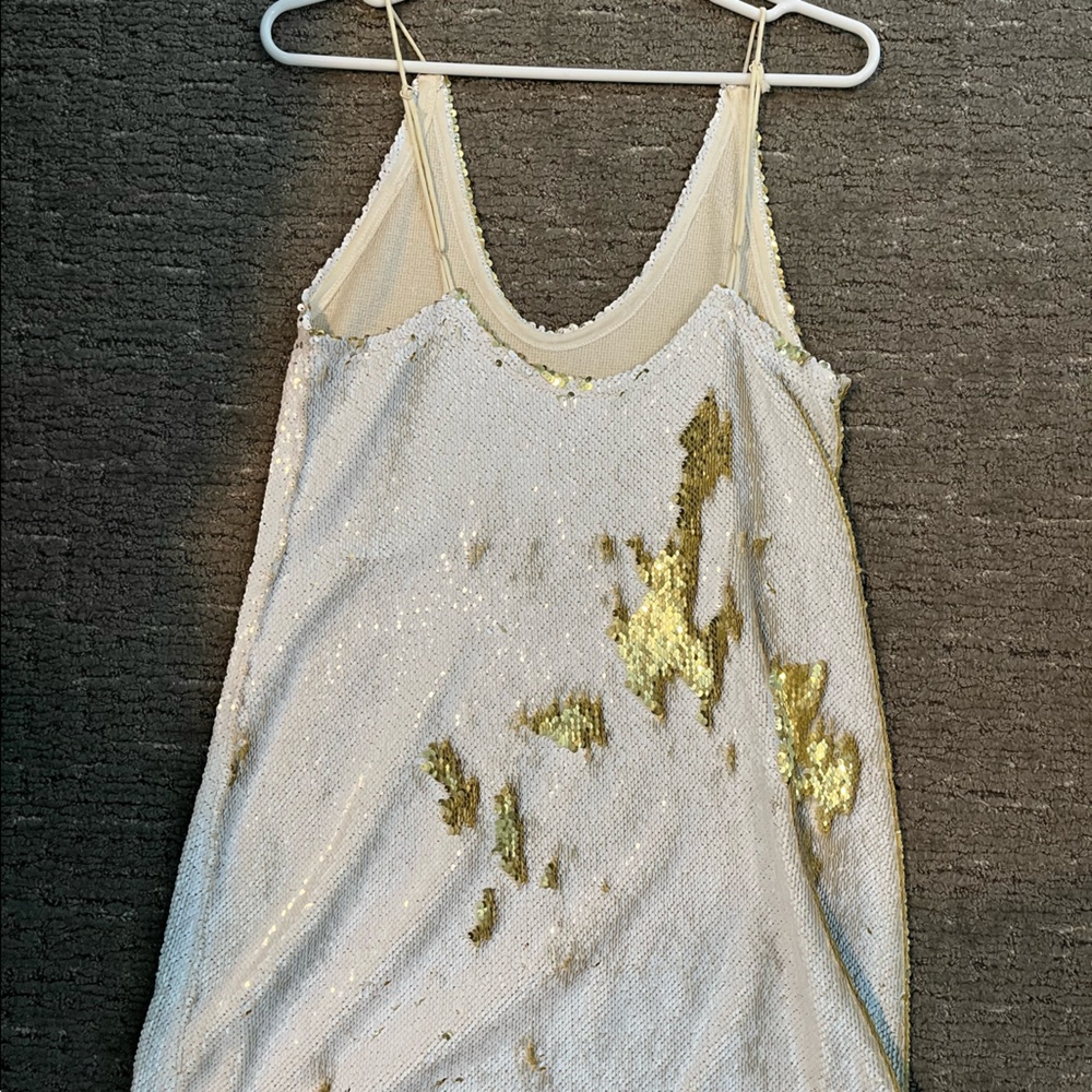 White and gold sequin dress
